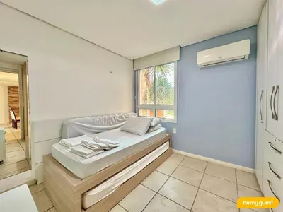 Uma cama ou camas num quarto em Resort incrível Vila do Porto