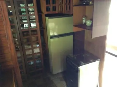 A cozinha ou kitchenette de Chalé das Helicônias
