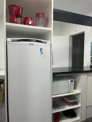 A cozinha ou kitchenette de Newlife Residence