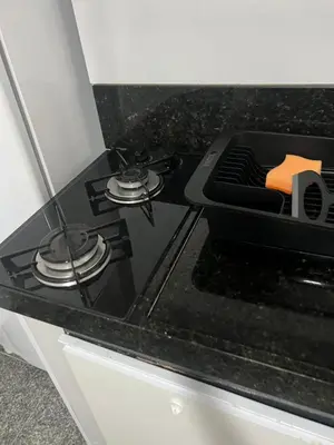 A cozinha ou kitchenette de Newlife Residence