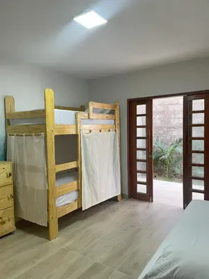 Uma cama ou camas num quarto em Espaço conforto e tranquilidade CASAVEG