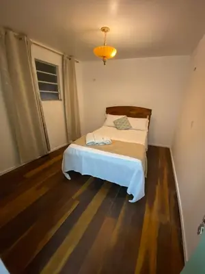 Uma cama ou camas num quarto em Apartamento Charme Guará - Na Praça de Guaramiranga
