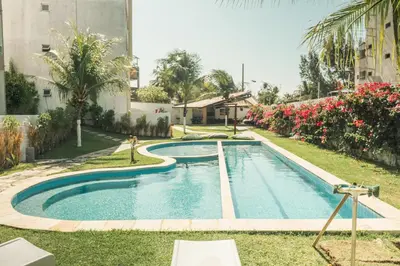 A piscina em ou perto de Apartamentos Cumbuco Condomínio Vila Real