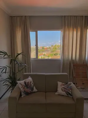Uma área de estar em Apartamento Praia do Futuro, 4qtos,300ms da praia