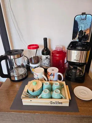 Comodidades para chá e café em B&B Pousada Swiss Residence