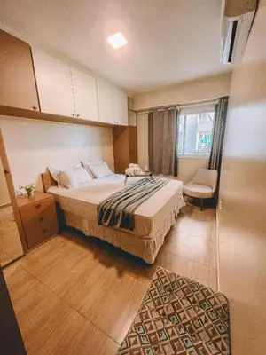 Uma cama ou camas num quarto em Ap Mary e Max - Cumbuco