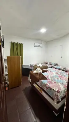 Uma cama ou camas num quarto em Pousada Capitólio 04 Canoa Quebrada