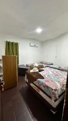 Uma cama ou camas num quarto em Pousada Capitólio 04 Canoa Quebrada