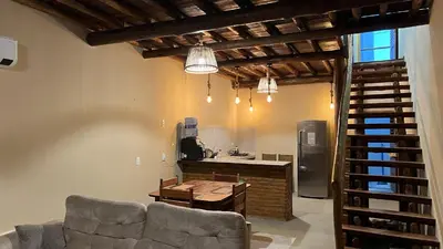 Uma área de estar em Apartamento Beira Mar Preá