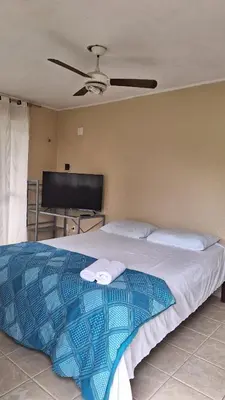 Uma cama ou camas num quarto em Pousada Rota Do Beija Flor PACOTI-CE