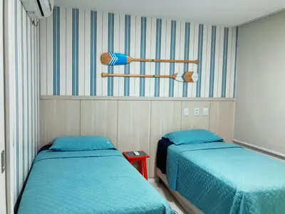 Uma cama ou camas num quarto em Ap 3 suítes Nascente Golfville Resort próx Beach Park