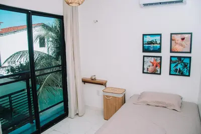 Uma cama ou camas num quarto em Casa Amar Cumbuco