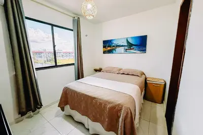 Uma cama ou camas num quarto em Casa Amar Cumbuco