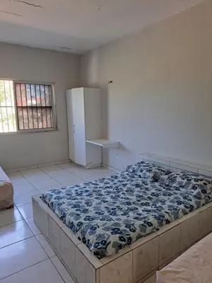 Uma cama ou camas num quarto em Pousada leblon