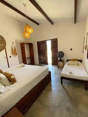Uma cama ou camas num quarto em Casas Oceanicas