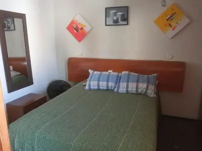 Uma cama ou camas num quarto em Flat via venetto ap 1501
