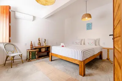 Uma cama ou camas num quarto em Casa na Praia Preá - Casa Inteira