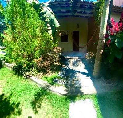 Um jardim no exterior de Casa De Praia 9 quartos Em Aguas Belas, CE