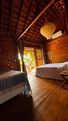 Uma cama ou camas num quarto em Bangalôs Flecheiras de Canaã