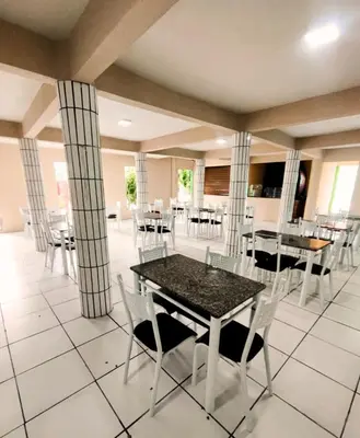 Um restaurante ou outro lugar para comer em Hotel Aconchego Cearense