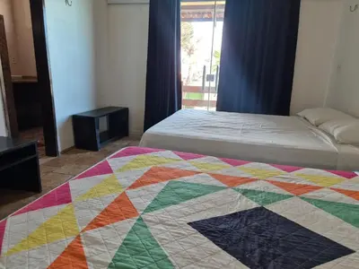 Uma cama ou camas num quarto em mansao922
