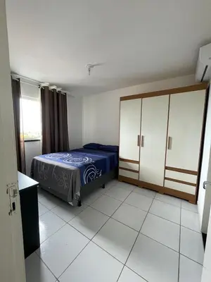 Uma cama ou camas num quarto em Apto com Ar com vista para praia de Morro Branco - Fortaleza