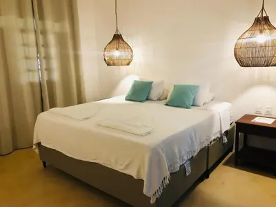 Uma cama ou camas num quarto em Villa Ava Kite - Guajiru