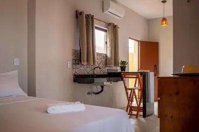 Uma cama ou camas num quarto em Pousada Rota do Kite Preá