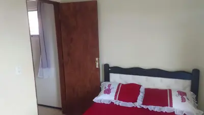 Uma cama ou camas num quarto em Chalé Sitio Miranda Sra Solange