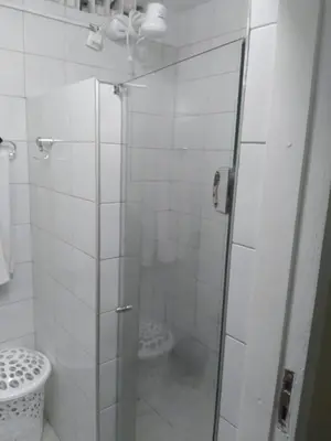 Uma casa de banho em Pousada Suítes Meireles