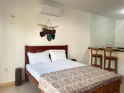 Uma cama ou camas num quarto em BRISAS DE FORTIM VILLAGE