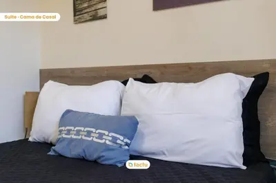 Uma cama ou camas num quarto em Apto compacto no VG Sun Cumbuco por Tactu