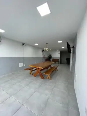 Uma área de estar em HOTEL GATAO