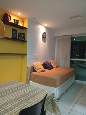Uma cama ou camas num quarto em Beach Class Fortaleza 1306