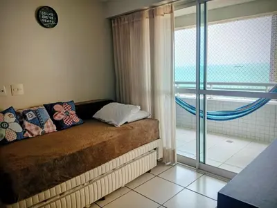 Uma cama ou camas num quarto em Beach Class Fortaleza 1306