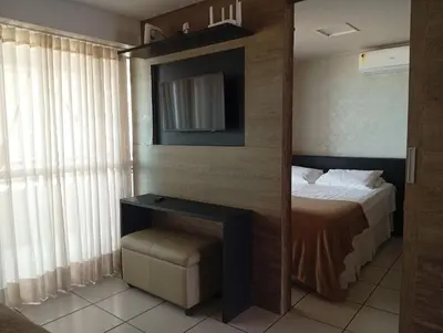 Uma cama ou camas num quarto em Beach Class Fortaleza 1306