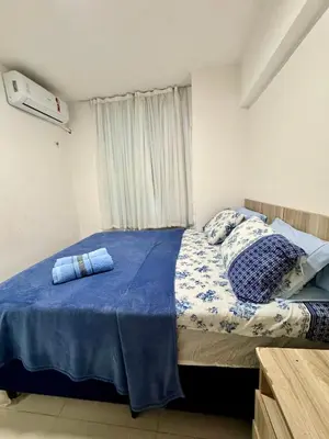 Uma cama ou camas num quarto em VG Fun Fortal