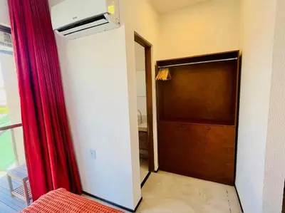 Uma cama ou camas num quarto em Paradise on Praia do Barro Preto