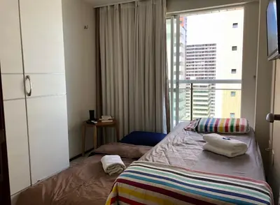 Uma cama ou camas num quarto em Apto à Beira Mar - Terraços do Atlântico
