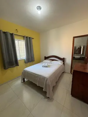 Uma cama ou camas num quarto em Casa Tropicana (2º andar)