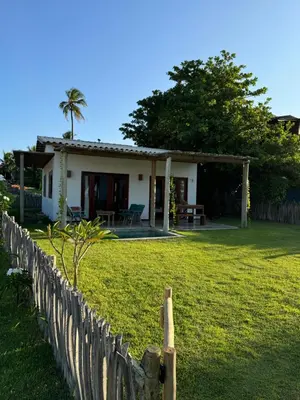 Um jardim no exterior de Casa Cajueiro - Os Navegantes
