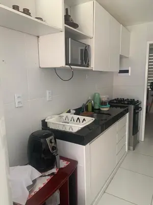 A cozinha ou kitchenette de Apartamento térreo no Morro Branco Marina II