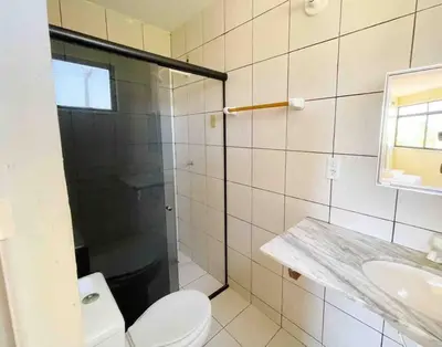 Uma casa de banho em Apartamento na praia da tabuba com vista mar