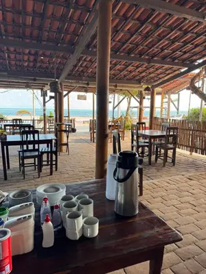 Um restaurante ou outro lugar para comer em Pousada das Canoas