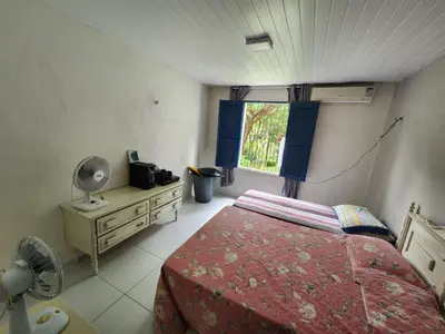 Uma cama ou camas num quarto em Serra do Matias