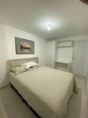 Uma cama ou camas num quarto em Apartamento 500m da Praia de Meireles
