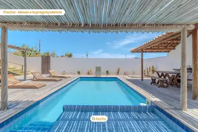 A piscina em ou perto de Apto c/ churrasqueira no Pontal do Maceió Tactu