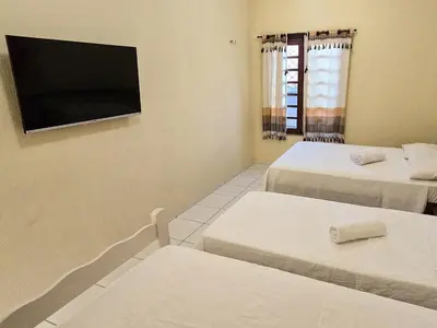 Uma cama ou camas num quarto em Pousada Viva Praia
