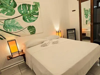 Uma cama ou camas num quarto em Pousada Viva Praia