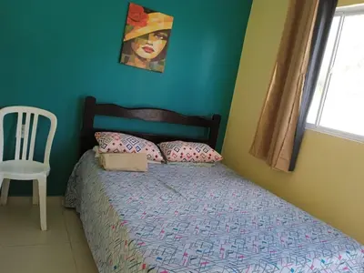 Uma cama ou camas num quarto em Pousada Vista Verde
